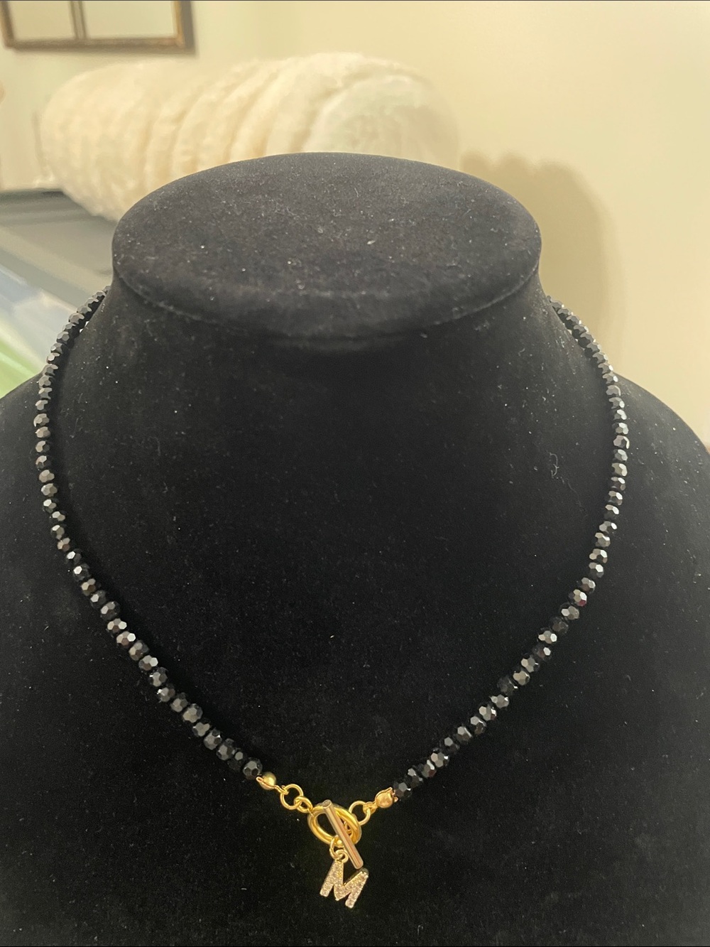 Source Unknown Black Beaded Necklace with Gold Toggle and 'M' Charm